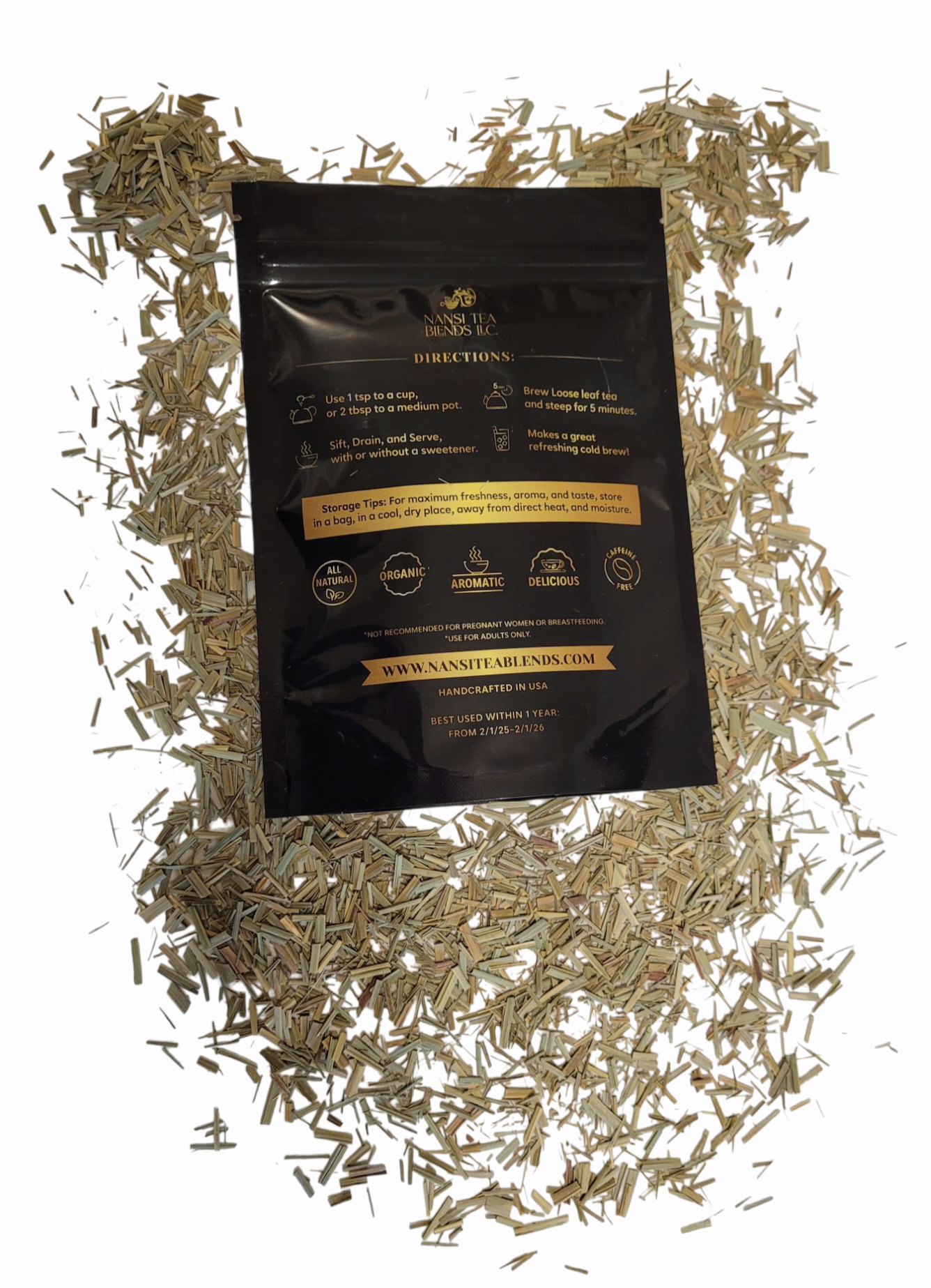 The back of Nansi Lemongrass Tea pouch surrounded by loose leaf tea on a white background.